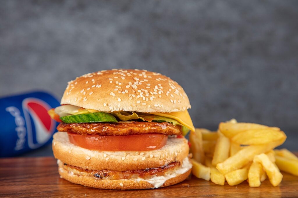 burger, double chicken burger, burger with fries, fries, burger with pepsi, tikki burger, spicy, tasty